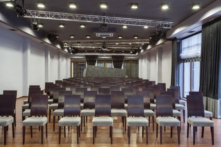 Woodland hotel conference hall with neatly arranged seats