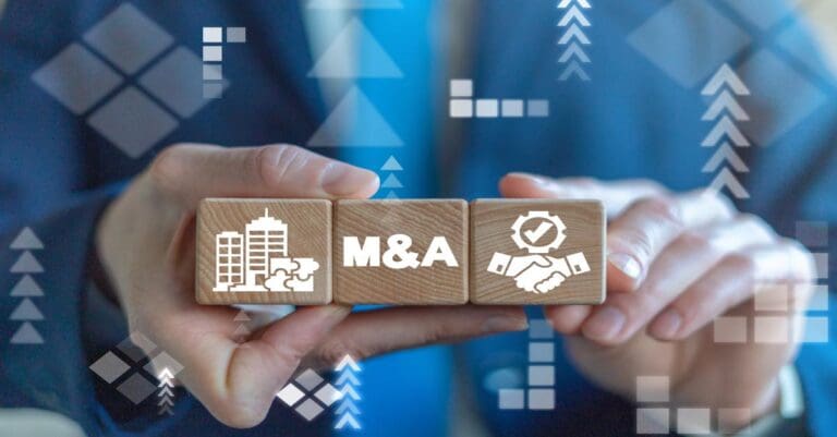 Merger and Acquisition Business Corporate Cooperation Company concept. M&Q partnership concept on wooden dices in businessman's hands.