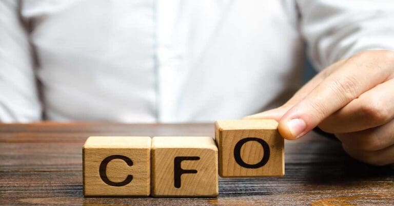 Interim CFO, A man makes the word acronym abbreviation CFO. Chief Financial Officer. Financial management in business and company. Risk. Development and growth. Appointment to a new post, promotion